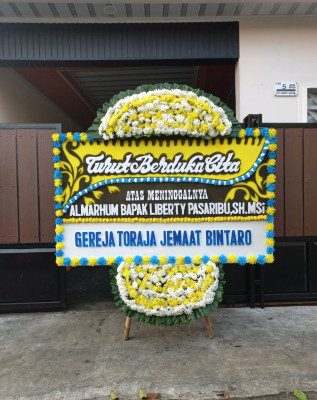 Papan Bunga Duka di Petasia Timur